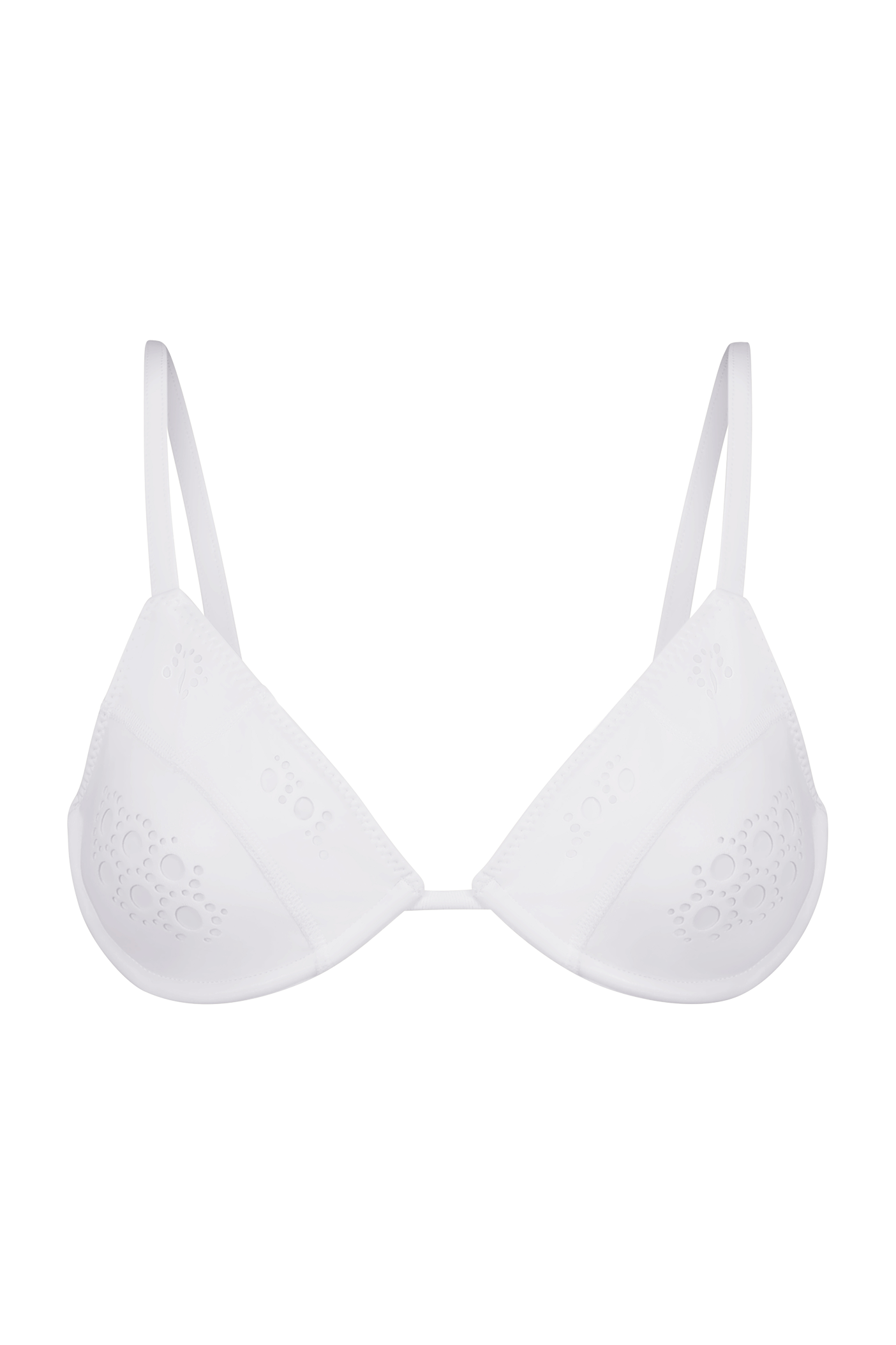 The Amy Top by Gigi C Bikinis is a white triangle bikini top with floral laser cutouts and thin adjustable straps. Its simple, elegant design offers a summery, stylish look. Removable pads add convenience, while the plain black background perfectly highlights the swimsuit.