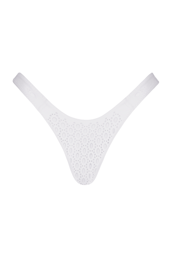 The Brooke Bottom by Gigi C Bikinis is a white V-shaped thong with high-cut legs, featuring a circular eyelet pattern for a stylish look and cheeky coverage, set against a black background.