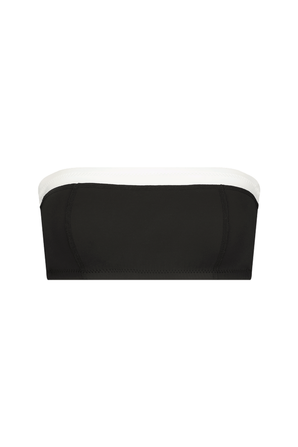 The Eddie Top from Gigi C Bikinis features a sleek, minimalist design with silky scuba fabric for a fitted look. This black and white strapless piece includes a horizontal seam and comes with an optional removable halter strap for versatile styling.