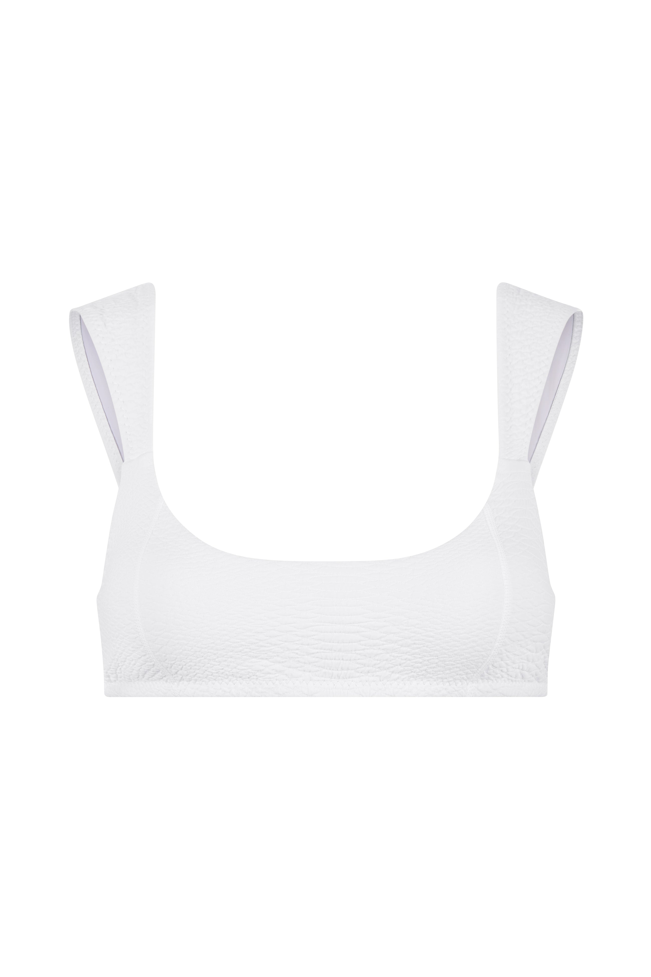 The Dawson Top by Gigi C Bikinis is a chic white crop top with snakeskin-embossed fabric, featuring wide straps and a square neckline.