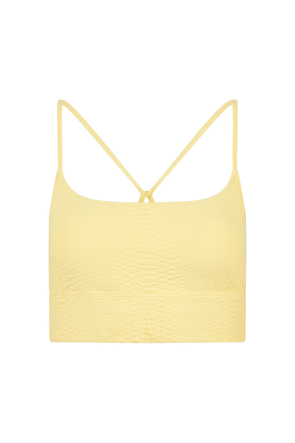 The Finle Bra by Gigi C Sport is showcased on a white background, featuring a yellow textured design with thin spaghetti straps and a subtle snakeskin embossed pattern for unique flair.