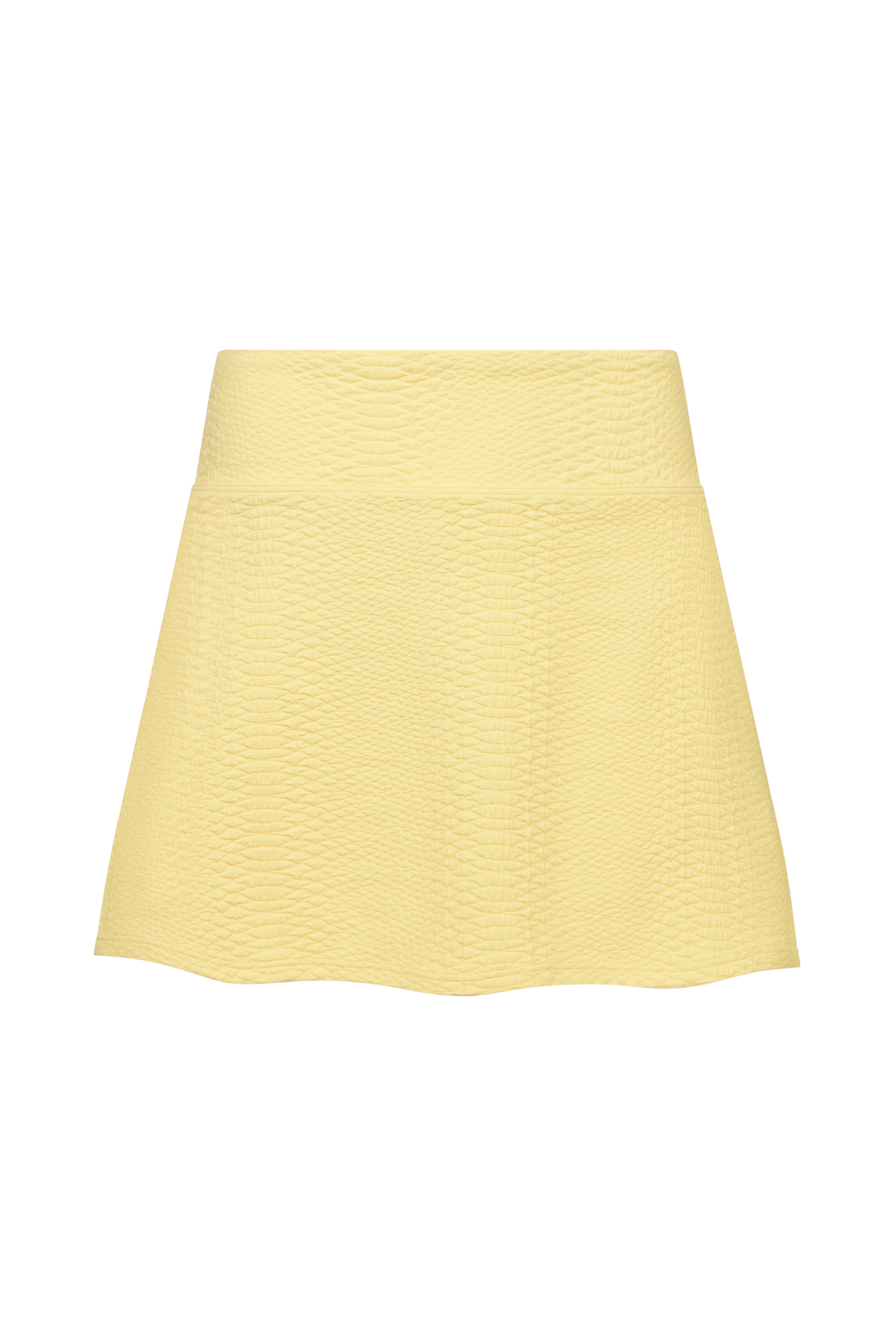 Introducing the Heidi Skort by Gigi C Sport: a high-waisted, textured yellow A-line skort with built-in shorts for comfort and style. Its subtle crinkle pattern adds unique texture against the plain white background.