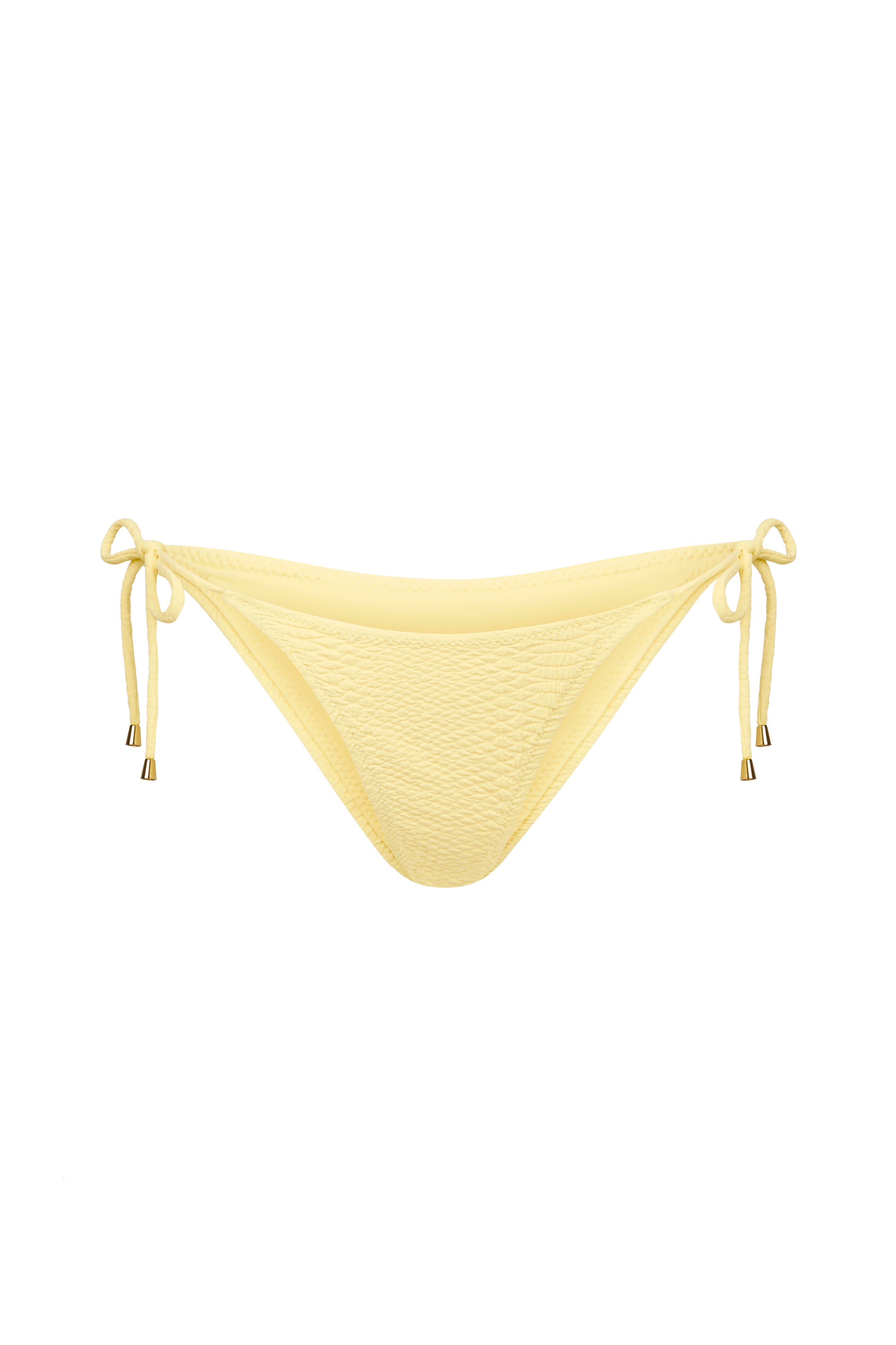 The Joni Bottom by Gigi C Bikinis is a yellow bikini bottom with snakeskin-embossed fabric and adjustable side ties featuring elegant gold tips, perfect for your summer ensemble.