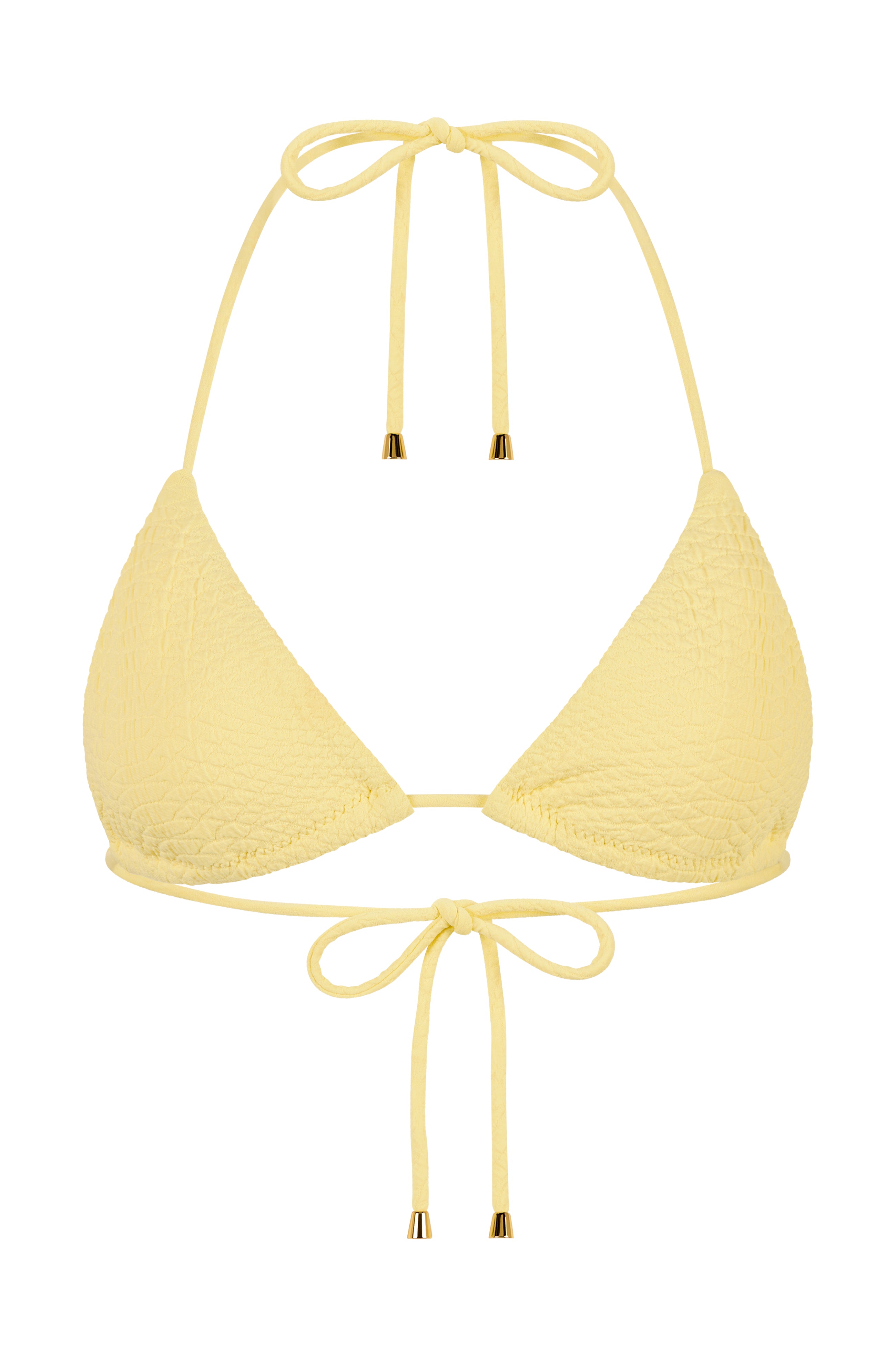 The Joni Top by Gigi C Bikinis is a yellow textured triangle bikini with a tied halter neck and back strings, features small gold-colored tips, and is crafted from snakeskin-embossed fabric.