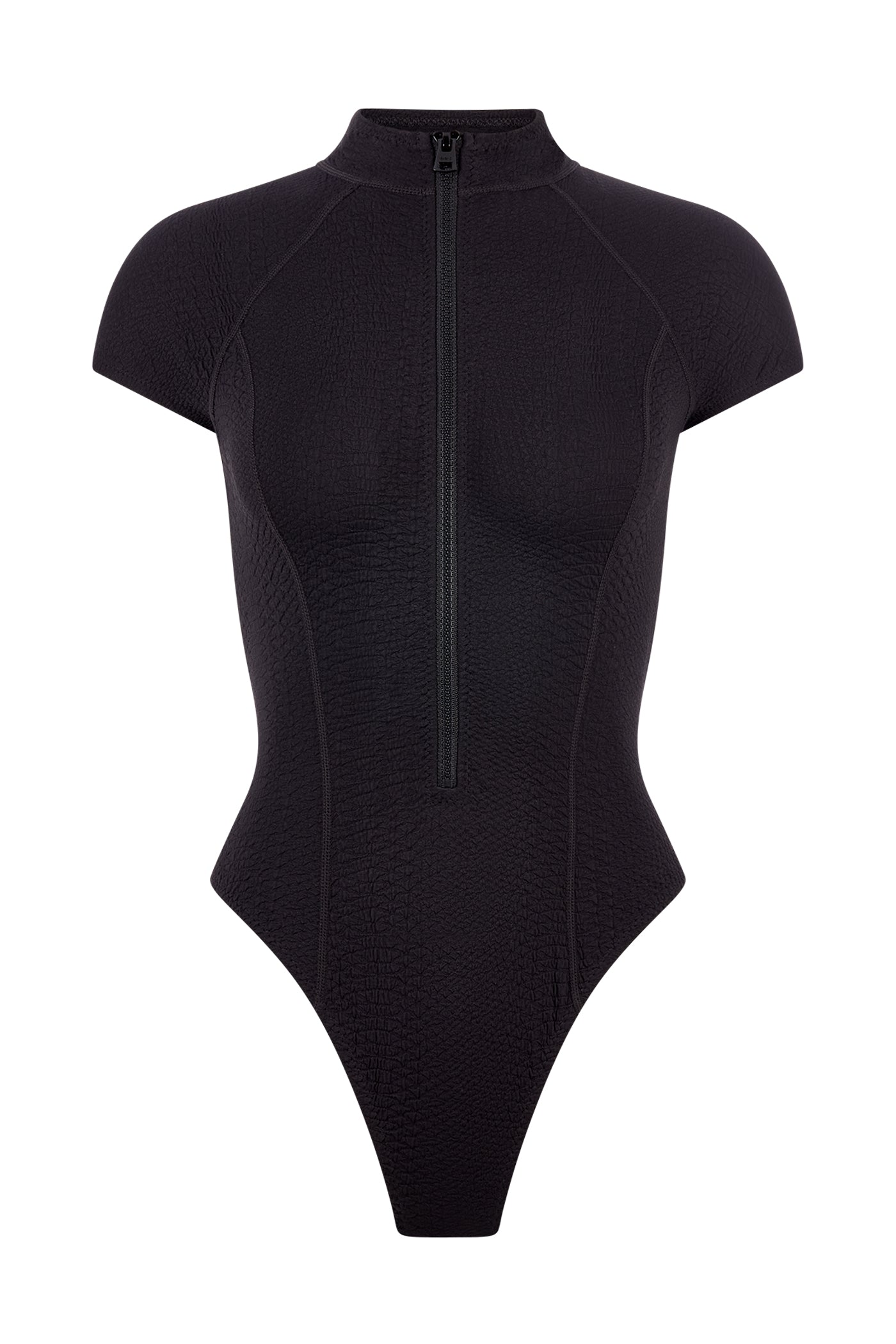 The Lilith Surfsuit by Gigi C Bikinis is a black, short-sleeved bodysuit with a high neckline and front zip closure, featuring snakeskin embossed fabric for a textured look and visible seam lines for a fitted appearance.