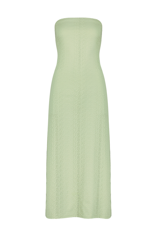 The Gigi C Bikinis Maya Dress, a strapless light green faux snake design with a textured fitted bodice and slightly flared skirt, is displayed on a black background. This simple yet elegant piece is perfect for chic poolside lunch attire.