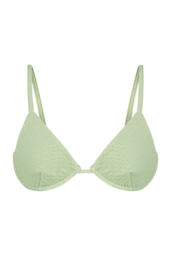 The Ruby Top by Gigi C Bikinis is a light green textured bikini top featuring adjustable shoulder straps and removable bust pads, displayed on a black background.