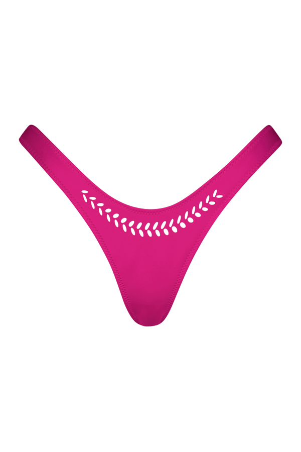 The Jaclyn Bottom by Gigi C Bikinis is a hot pink, low-rise thong made from scuba fabric, featuring laser-cut leaf patterns along the waistband on a solid black background, highlighting its vibrant color and intricate detailing.