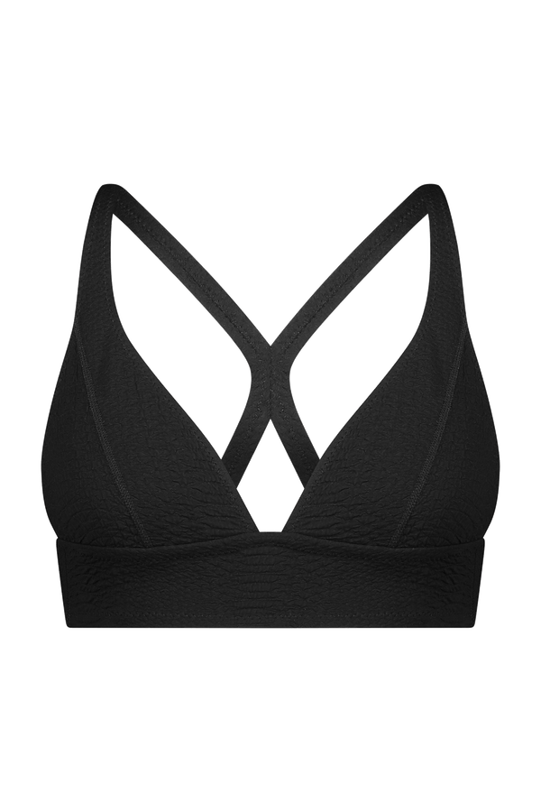 The Marissa Bra by Gigi C Sport features a criss-cross back and faux snake pattern in black, providing bi-stretch compression for medium support and an athletic look against a white backdrop.