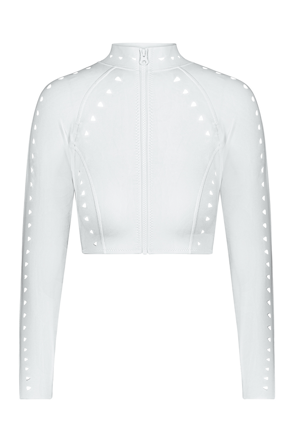The Morgan Surf Jacket by Gigi C Bikinis is a white long-sleeve crop top with a front zipper, made from sleek scuba fabric. It has triangular perforations on the sleeves and shoulders, offering an edgy vibe with its geometric cutout design for a form-fitting silhouette.