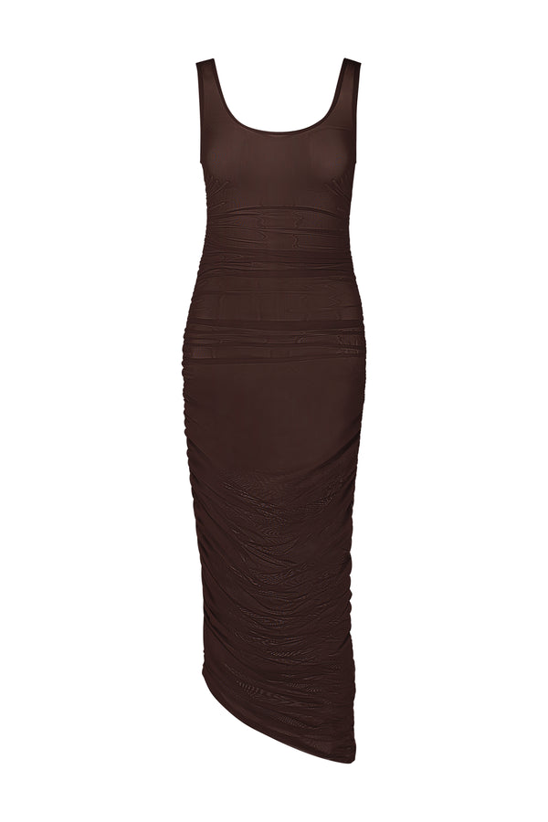 Introducing the Stevie Midi Dress by Gigi C Bikinis: a sleeveless brown bodycon crafted from silky mesh fabric, featuring a scoop neckline, ruched detailing, and an asymmetrical hemline. This knee-length dress is beautifully displayed against a white background.