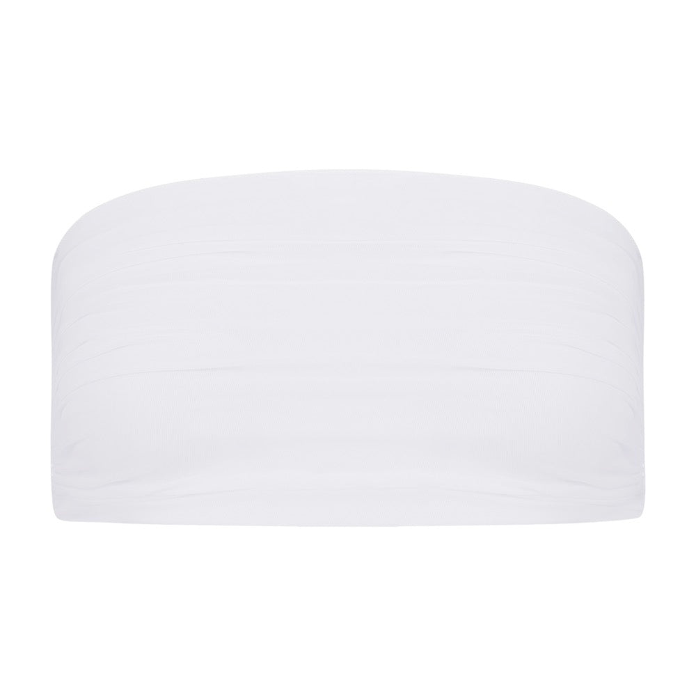 The Odette Top by Gigi C Bikinis is a white, strapless bandeau available on a plain white background. Its silky smooth and stretchy fabric makes it ideal for casual or layering wear.